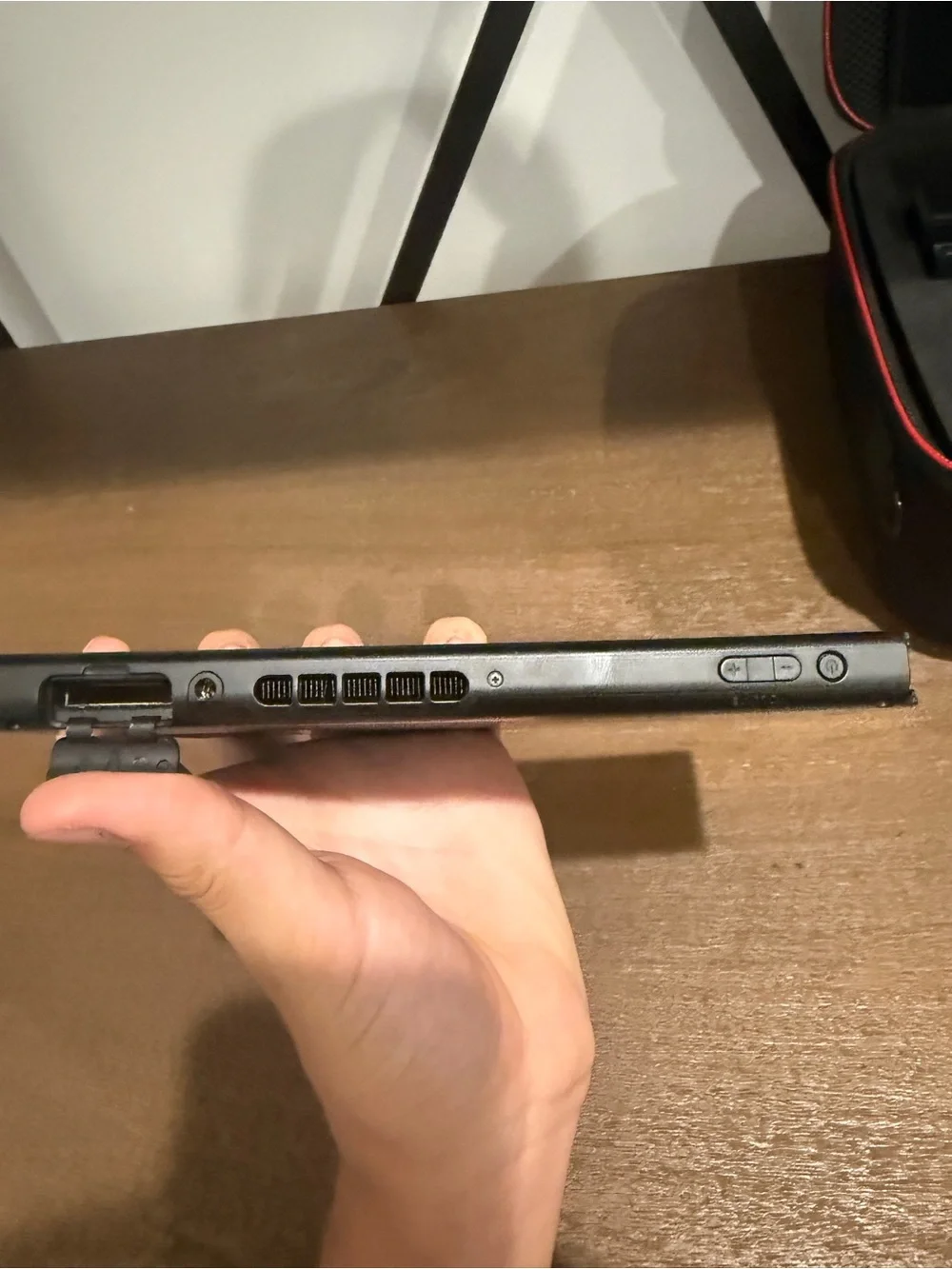 Nintendo Switch Console with Black Dock and Black Case Trimmed in Red